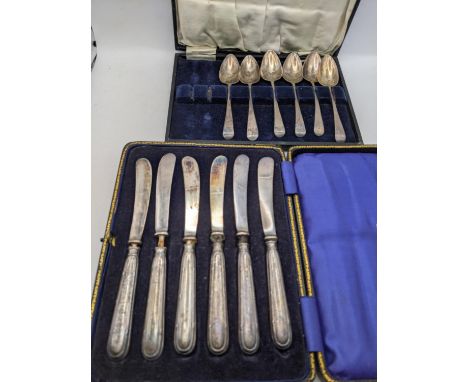 A cased set of six silver handled butter knives A/F, Sheffield 1909; along with five silver teaspoons, two missing from case,