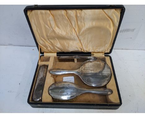 A early 20th century silver backed four piece dressing table set, Chester 1923, casedLocation: 