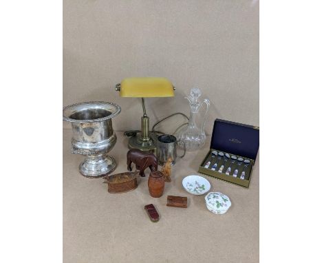 A mixed lot to include a table lamp, a silver plated Champagne bucket, a tankard, together with a vesta case inlaid with semi