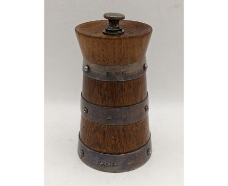 An Edwardian silver bound and oak pepper grinder of milk churn form by Hukin & Heath, hallmarked London 1905Location: 