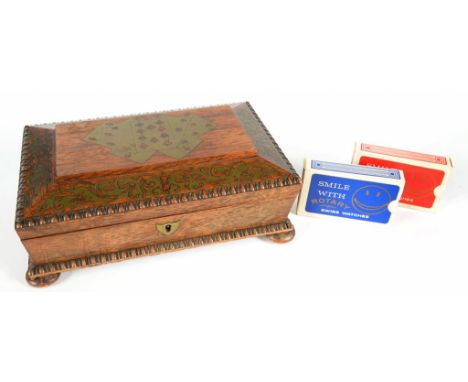 A VICTORIAN CUT BRASS INLAID ROSEWOOD PLAYING CARD BOX OF SARCOPHAGUS SHAPE WITH BEADED RIMS, THE INTERIOR DIVIDED INTO COMPA