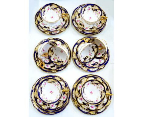 A COALPORT COBALT BORDERED TEA SERVICE, PRINTED AND PAINTED WITH SCATTERED ROSES, PRINTED MARK, C1910