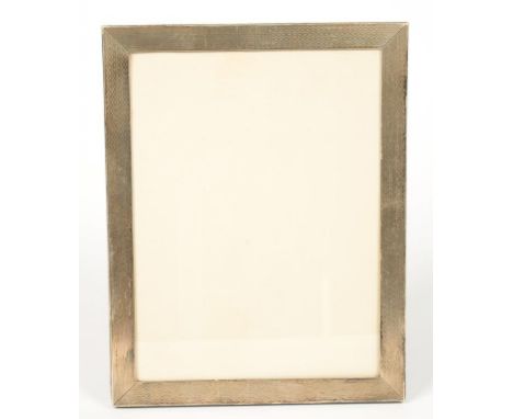 AN ELIZABETH II SILVER PHOTOGRAPH FRAME, ENGINE TURNED, 23 X 18.5CM, LONDON 1967