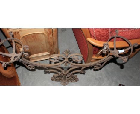 A wrought iron bridge lamp