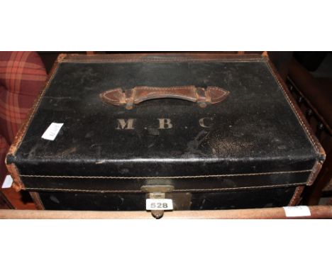 A canvas and leather bound trunk. 18' wide