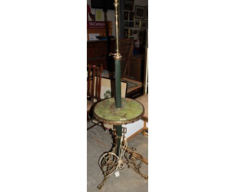 An early 20th Century wrought gilt brass telescopic lamp standard with half-height onyx table stage
