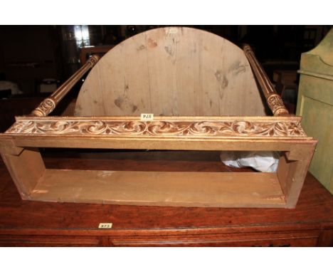 A giltwood console table carved with scrolling acanthus on fluted legs. 36' wide