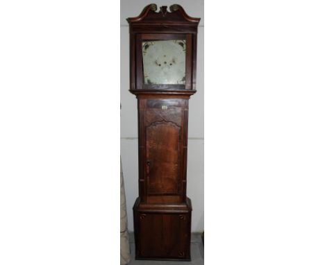 An oak and mahogany longcase clock with 8 day movement, the enamel dial with painted spandrels. 81' high