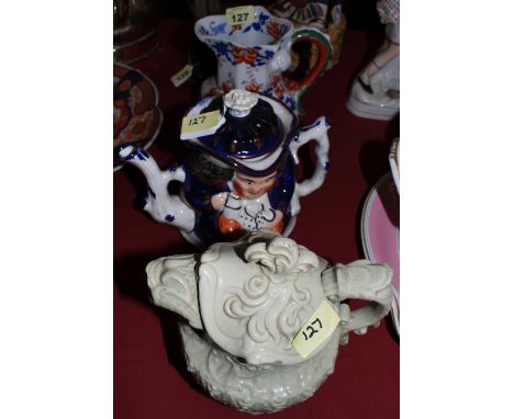 A Masons Ironstone hydra jug, an Allertons character teapot and a Victorian water jug with cover