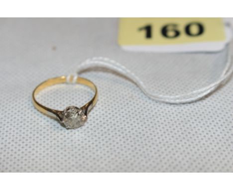 A diamond solitaire ring, the stone 1 carat approx. In gold marked 18ct. Size R