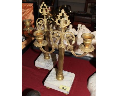 A pair of French gilt metal two light candelabra on marble bases. 12 ½" high