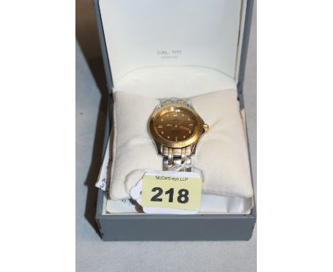 An Omega Seamaster Automatic chronometer cal. 1111 120 gentleman's wristwatch, the stainless steel case with 18ct bezel, crow