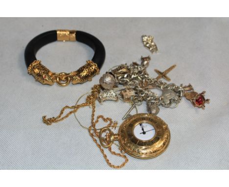 A silver charm bracelet, watch and a bangle