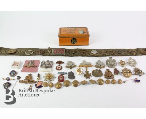 WWI era cap badges including Manchester Regiment; Duke of Wellington West Riding Regiment, Royal Artillary, North Stafford, S