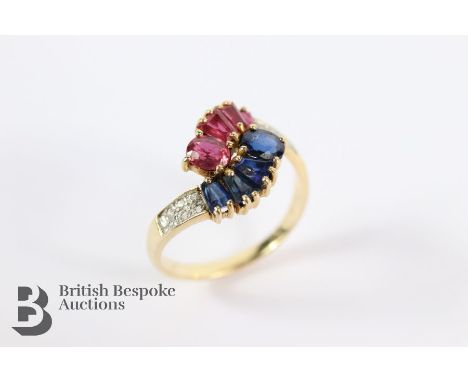 14/15ct yellow gold ruby, sapphire and diamond ring. The ring set with rubies, sapphires 4.40 x 3.8mm each and 6 pts of dias,