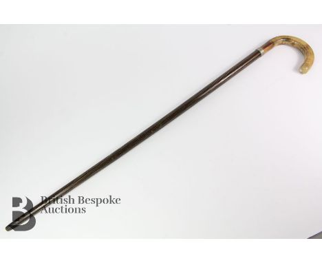 Early 20th century sword stick, the blade of tapering form approx 67 cms, enclosed in unusual wood casing, approx 91 cms in l