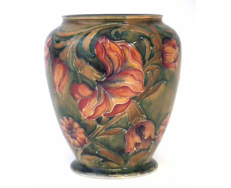 Moorcroft vase, decorated with Spanish design on a green ground, painted mark to base, 14cm high     Condition report: No dam