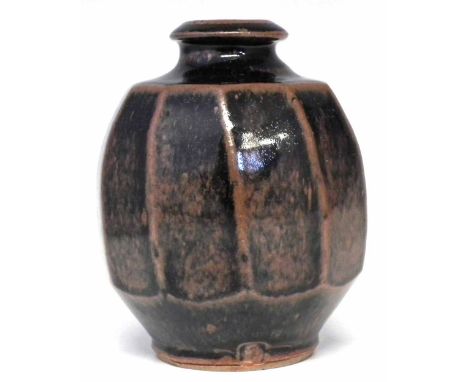 Mike Dodd (b.1943) vase, decorated with tenmoku glaze, on faceted sides, impressed monogram to side of foot, 14cm high   Arti