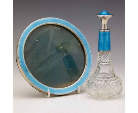 Silver and turquoise enamel scent bottle and circular photo frame (2).
 
Condition report: Photo frame - strut missing, hallm