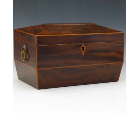 Regency mahogany tea caddy with two lidded compartments and a central glass bowl, width 29cm.