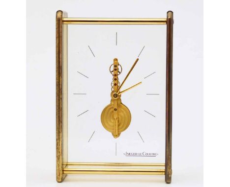 Jaeger-LeCoultre small mantel clock, the gilt metal 16-jewel skeleton movement floating in its Perspex and gilt metal rectang