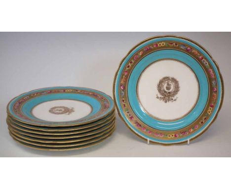 Eight Cauldon 15th Kings Hussars Regimental marked plates, painted with floral borders on gilt and turquoise bands, retailed 