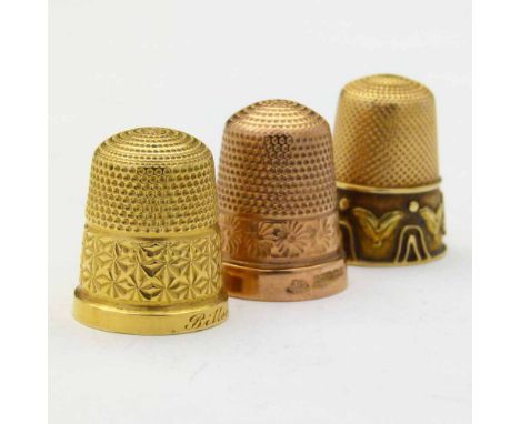 15ct yellow gold thimble, Chester 1926; 9ct rose gold thimble, Birmingham 1919; unmarked thimble, perhaps originally with a b