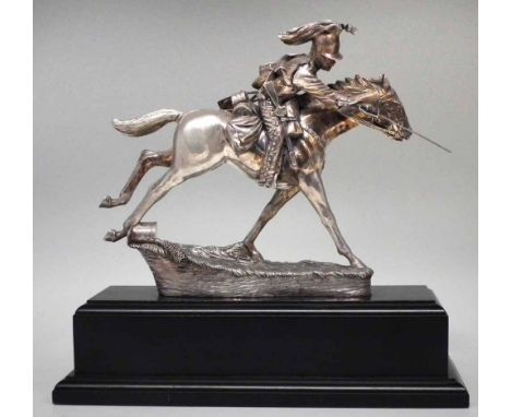 White metal mounted Kings Dragoon Guard cavalry trooper, mounted on wood plinth, 31cm overall height    Condition report: The