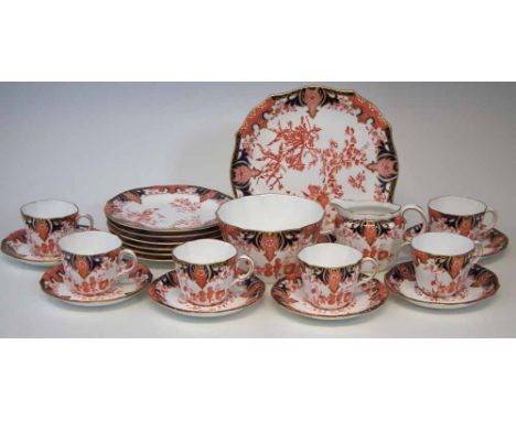 Crown Derby tea set decorated with Imari pattern 2712, consisting of six cups, saucers, side plates, cream jug, sugar bowl, a
