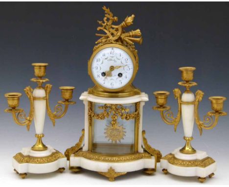 French gilt metal and alabaster clock garniture, the drumhead case with an enamel dial named Balyo, Boulogne sur Mer, eight d