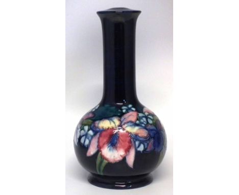 Moorcroft lamp, decorated with orchid pattern on a blue glaze, 36cm high     Condition report: No damage or restoration, over