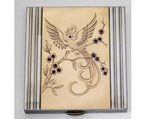 French silver, gold and ruby art deco cigarette case or compact, the rectangular inset gold leaf engraved with a phoenix and 