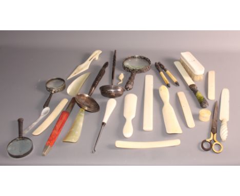 A Georgian silver toddy, three magnifying glasses, a Sri Lankan ladle, an ivory and silver letter opener and an assortment of
