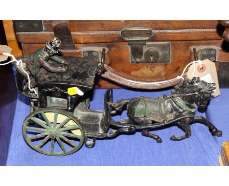 A cast iron and painted model of a hackney carriage, 12" long
