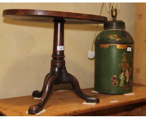 A green and gilt japanned metal tea canister, painted oriental figures (fitted as a table lamp), 28" high, and an oval Georgi