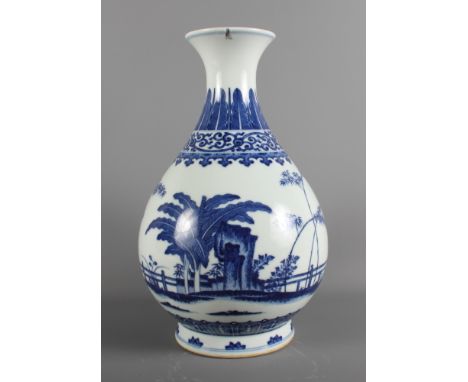 A Chinese porcelain blue and white baluster vase decorated continual landscape with Chien-Lung seal mark to base, 12" high (c