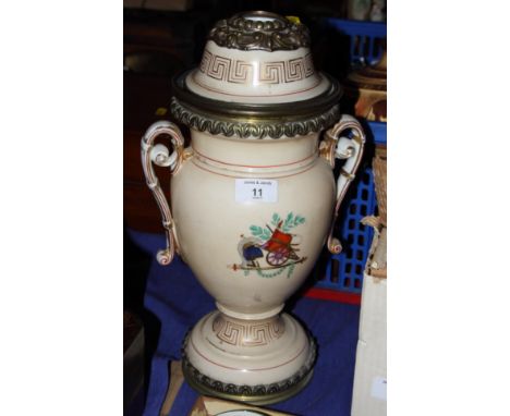 A 19th Century relief moulded jug, 9" high (hair crack to base) and a continental porcelain oil lamp base, 14" high (no reser