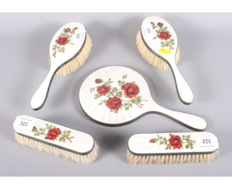 A silver guilloche enamel rose decorated five-piece vanity set