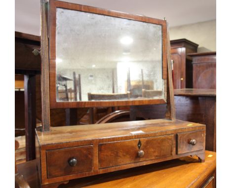 A 19th Century toilet mirror, fitted three drawers, on bracket supports, 20" wide