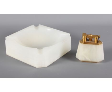 A Dunhill onyx table lighter with matching ashtray