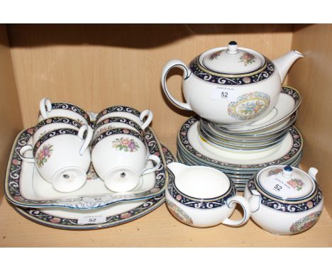 A Wedgewood "Runnymede" porcelain teaset comprising teapot, sugar and cream, six cups, five saucers, seven side plates and tw