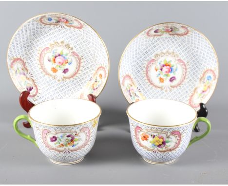 Two 19th Century hand-painted Coalport cups and saucers