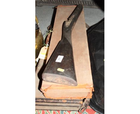 A brown canvas covered shotgun case, maker's label for "W R Leesom Ashford Kent" containing gun cleaning paraphernalia, anoth