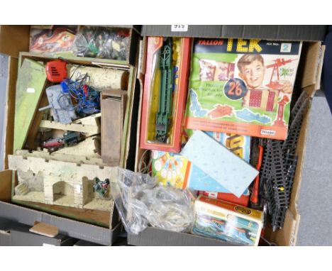 A collection of vintage children's toys including boxed magic robots set, railway stock waggons, wooden castle, Timpo soldier