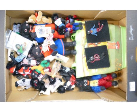A collection of small Golly type dolls including Steiff Golli G and Molli together with a collection of Gills Cousins branded
