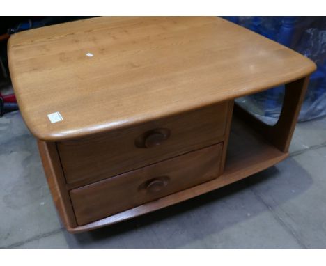 Mid-Century Ercol Pandora's box coffee table in honey elm 