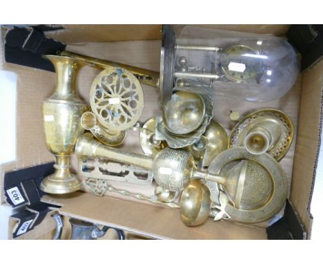 A collection of brassware items to include vases, candlesticks, mantle clock etc