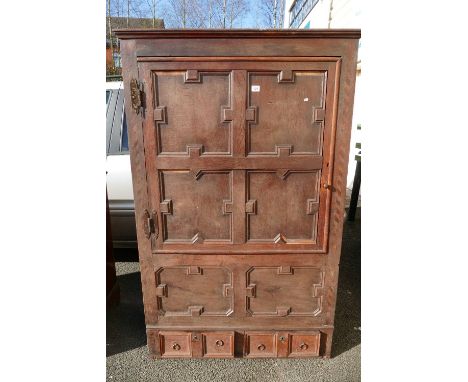 An early Oak panelled housekeepers cupboard with a single door above two smaller drawers and inlay to sides. (Missing origina