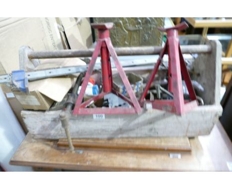 A collection of tools to include clamps, drill bits, hinges, hammers etc in a vintage tool box