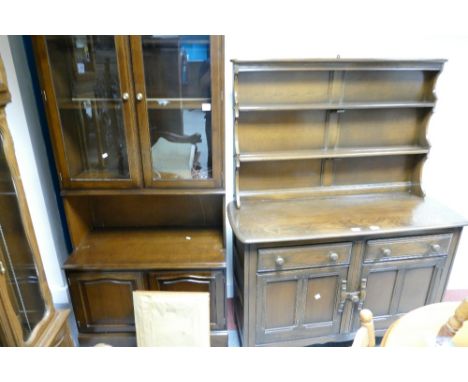 A stag slim display cabinet with two glazed doors above two door base and a elm Ercol two over two Welsh dresser (2)